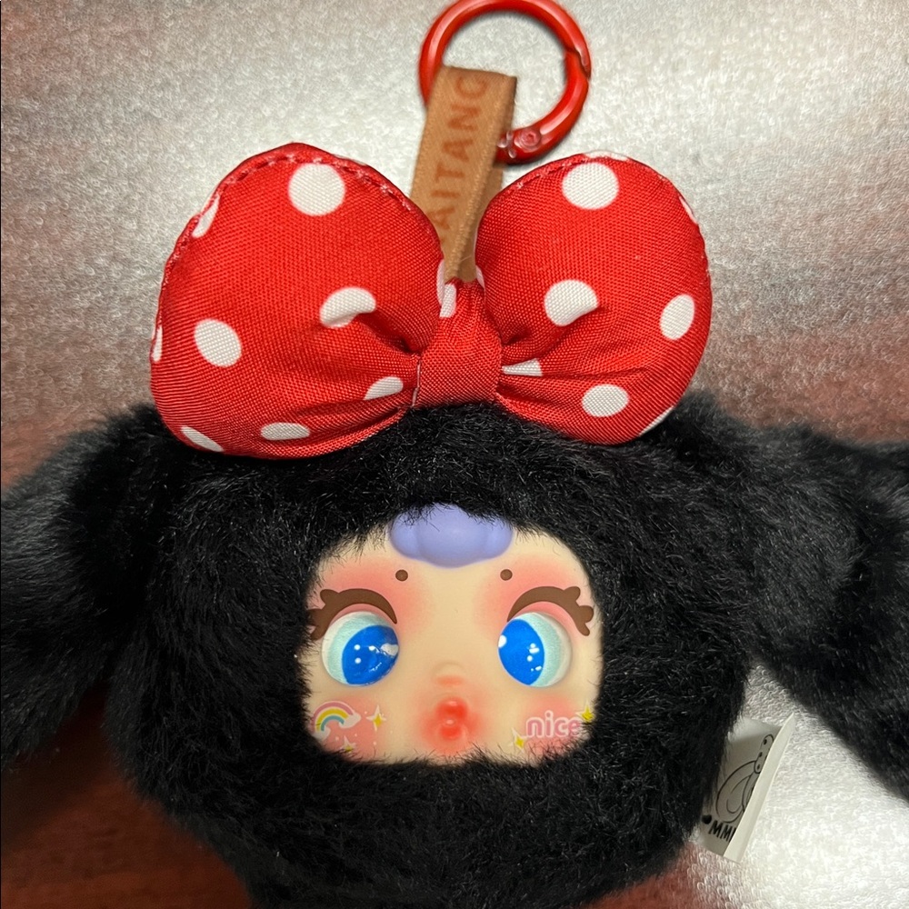 Cute Plush Toy with Red Polka Dot Bow!  Confirmed.